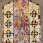 multicolored quilt in pastel colors representing the Cross