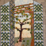 quilt with a tree image representing nature and growth