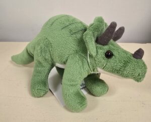Hudson is a green dinosaur stuffie